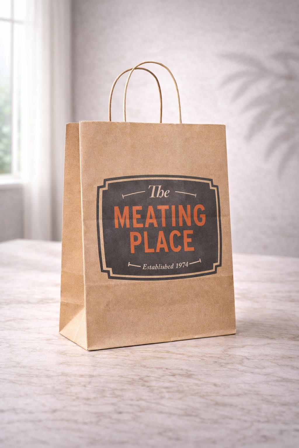 Large kraft twisted handle paper bag with The Meating Place branding